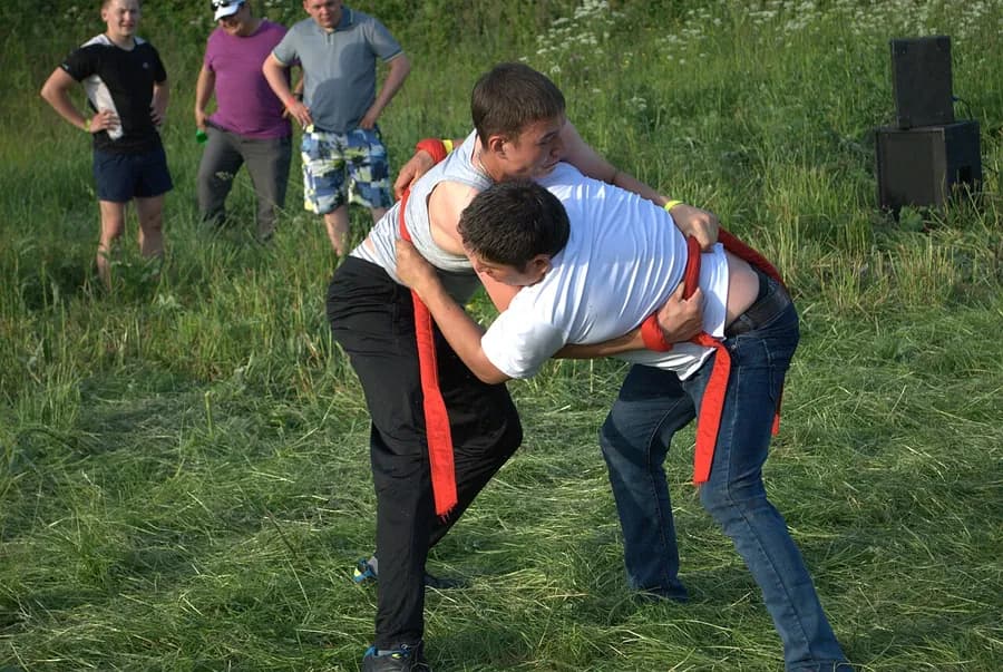 Kurash wrestlers gripping jackets